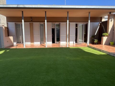 Casa en una sola planta amb jardí, porxo i garatge per a dos cotxes a Vilaroja